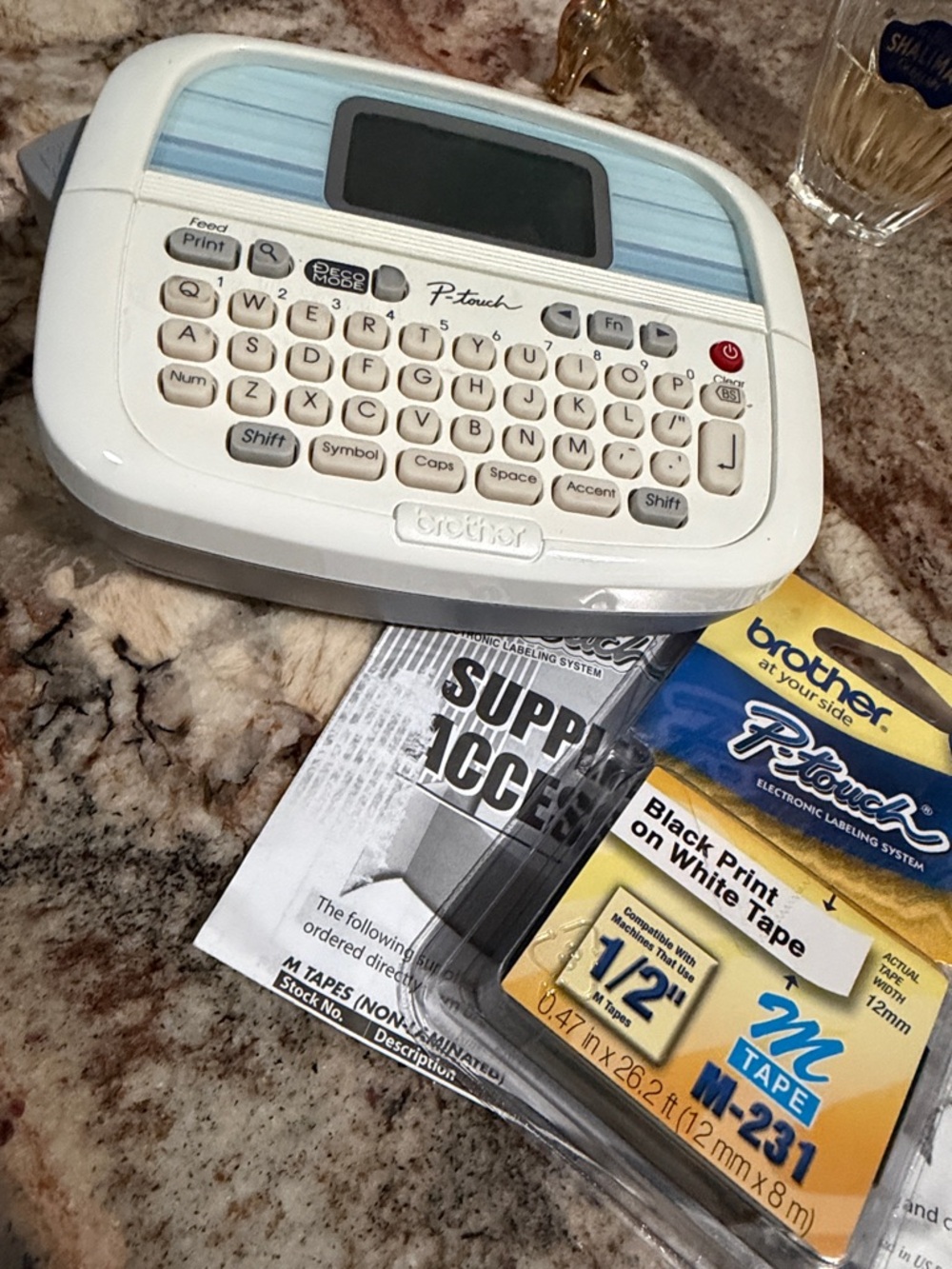 Brother P-touch Label Maker in White with Light Blue Accents